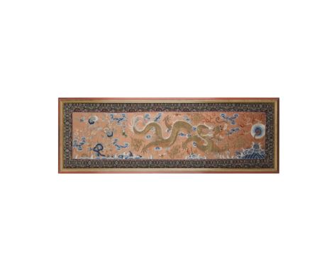 EMBROIDERED RUST-RED GROUND 'DRAGON' PANELLATE 19TH/EARLY 20TH CENTURY worked in satin stitch and couched gold-wrapped thread