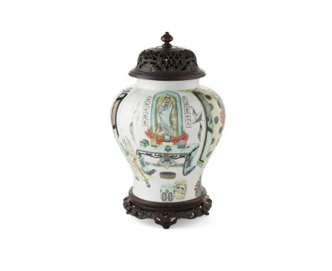 FAMILLE VERTE BALUSTER JAR AND COVERKANGXI SIX-CHARACTER REIGN MARK BUT 19TH CENTURY painted and gilt with a portrait of Guan