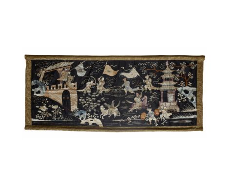 EMBROIDERED SILK BLACK-GROUND PANELQING DYNASTY, LATE 19TH CENTURY depicting a battle scene between warriors on horseback and