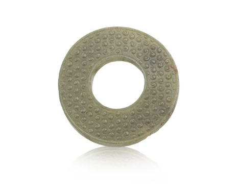 GREEN JADE DISC, BIPOSSIBLY EASTERN ZHOU DYNASTY the flat disc with a central aperture encircled by a plain border repeated a