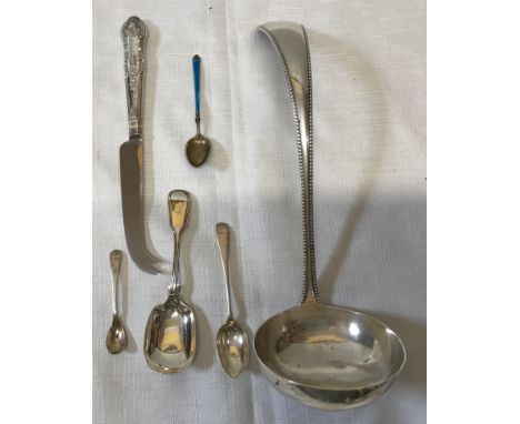 Three hallmarked silver spoons weight 38gms together with a silver plated ladle, a small white metal enamelled spoon and a si