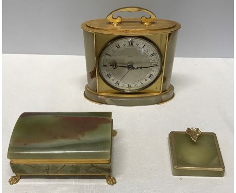 Mid to late 20th century light green onyx mantel clock timepiece by 'Tempora' with a round silver dial and Roman chapter ring