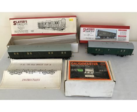 Two Slater 0 gauge boxed scale model kits, SR/BR Bogie Guards Van and 4 wheeled Guards Van together with a Gaugemaster transf