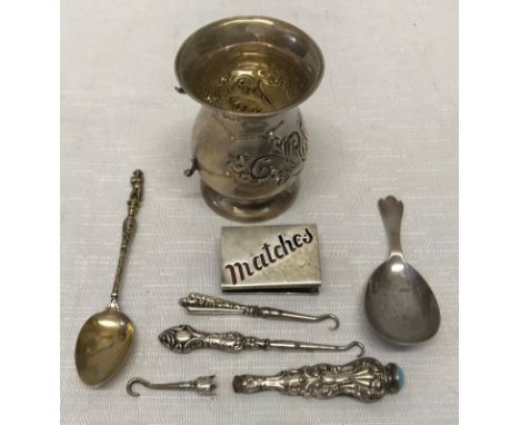 A selection of small silver items to include: matchbox cover J.D.W.D. Birmingham 1901, small mug missing handle J.D.W.D. Shef