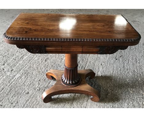 A Regency rosewood fold over card table with green baize, half reeded stem on 4 feet. 91cms w x 46cms d x 74cms h.Condition R