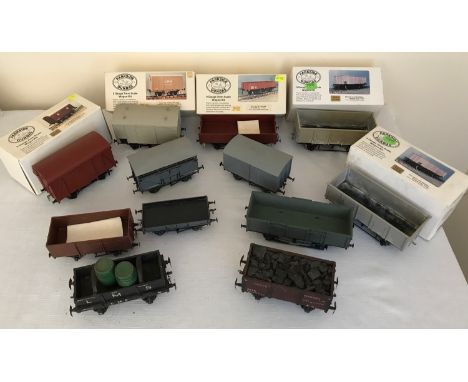 A quantity of Parkside Dundas 0 gauge 7mm Scale Wagon kits, 5 with boxes , 5 unboxed and two scratch built LMS wagon and coal