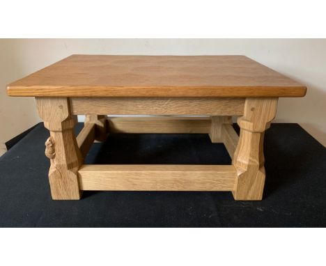 A light oak Robert (Mouseman) Thompson footstool with adzed top. 40cms x 28cms x 20cms h.Condition ReportGood.