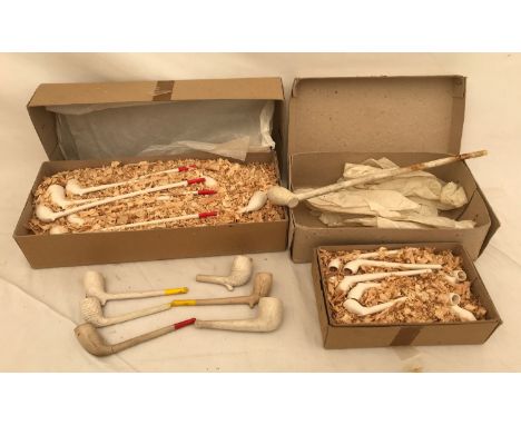 A collection of 24 Church Warden 9 inch clay pipes, as new, 6 other clay pipes and one long pipe found in Dagger Lane, Hull. 