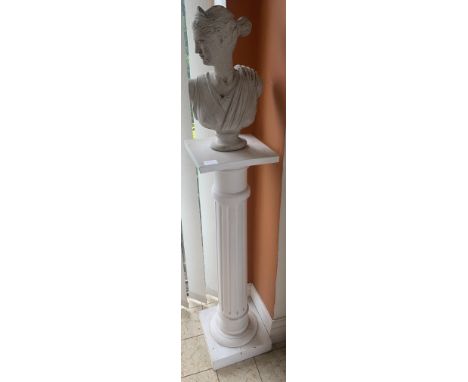 A painted wooden plinth with plaster bust. Plinth 112cms, bust 47cms.