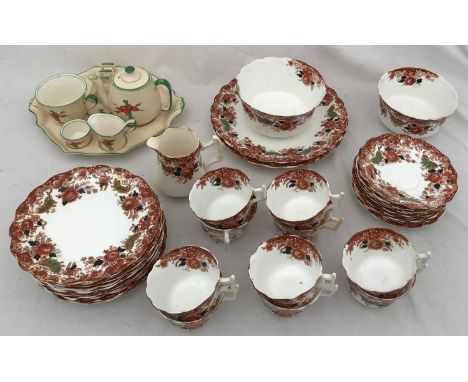 A part Wellington china tea service to include one milk jug, 2 sugars, 10 cups, 10 saucers, 2 plates 24cms d and 12 side plat