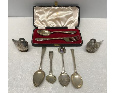 A selection of silverware to include teaspoons, one Georgian, one Pand O enamelled, one condiment spoon, a cased Viners spoon