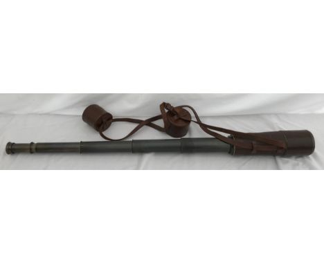 A Dolland London leather cased 4 drawer brass telescope. Open length approx. 105cms.Condition ReportMisty through eye lens, n