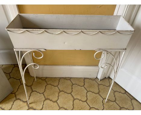 A 1950's white painted metal plant trough. 62cms w x 73cms h.