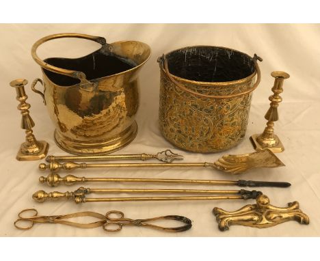 A collection of brass to include 2 coal buckets, 2 candlesticks, coal shovel, poker, coal pinchers, fork, rest and 2 coal sci