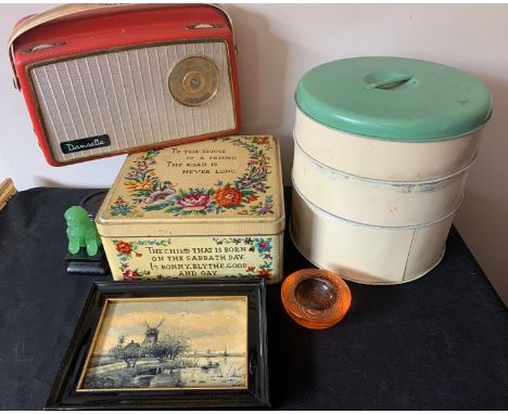 A miscellany to include biscuit and cake tins, glass bowl, Hilton Dansette radio, modern dog of fo, Chinese wooden stand and 