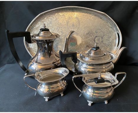 Silver plate to include galleried engraved tray on 4 claw feet and a set comprising teapot, coffee pot , milk/cream jug and l