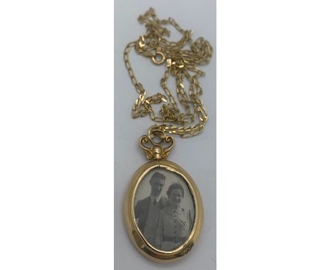 A 9ct gold locket on 9ct gold chain, 76cms l. 7.4gms total.Condition ReportSome slight dents to surround of locket in places.