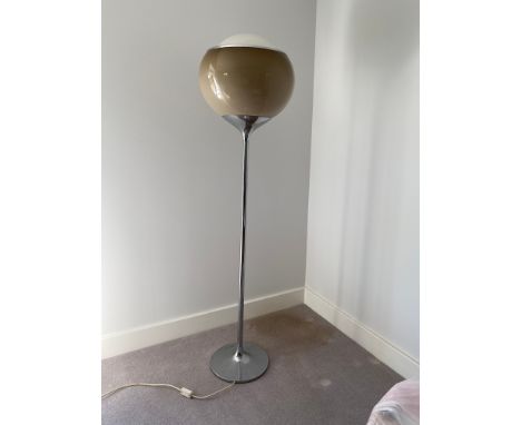 Harveiluce I. Guzzini  A 1970's chrome standing uplighter standard lamp with brown acrylic globe shade and tall chromes tulip