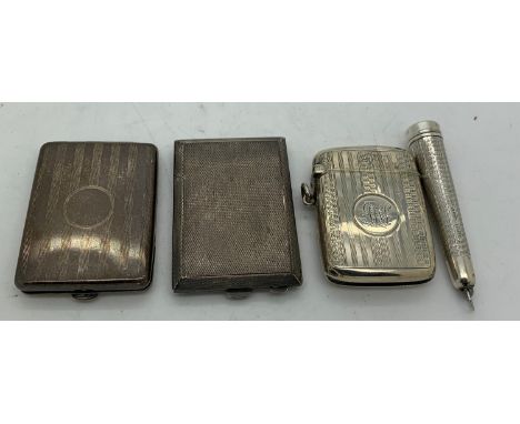 Two silver match book covers with engine turned decoration, Chester 1936, Birmingham 1922, a vesta Birmingham 1908 and a Ster