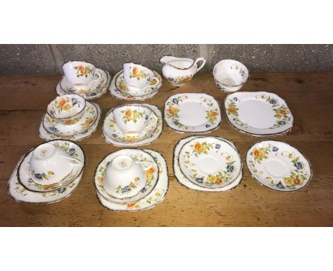 Royal Albert floral patterned tea set, pattern no. 7729. 27 pieces including 6 cups, 6cms h, 8 saucers, 14cms d,  9 side plat