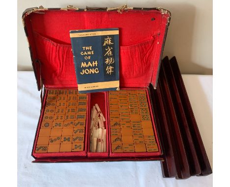 A vintage Mahjong set with wooden tile holders.Condition ReportUsed.