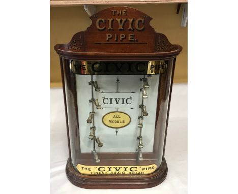 A tobacconist shop counter top, mahogany Civic Pipe display cabinet, registered design number 556025. The Imperial Tobacco Co