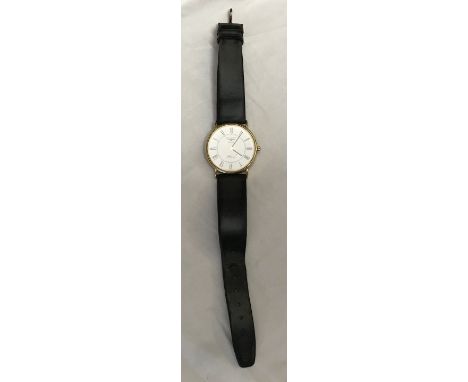 A Longines Presence quartz 9ct gold cased wristwatch with leather strap, Stamped to the back of the case 375 and number 24.32