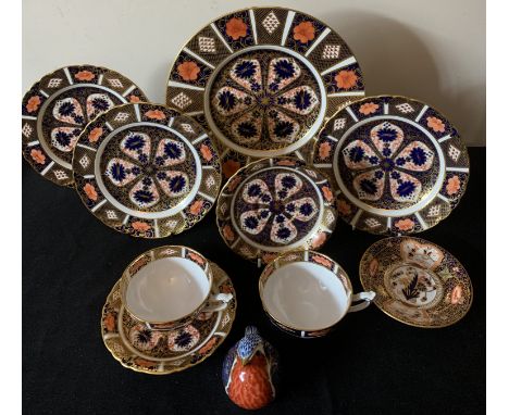 A selection of Royal Crown Derby to include Imari dinner plate, 3 small plates and 2 cups and saucers together with a spare s