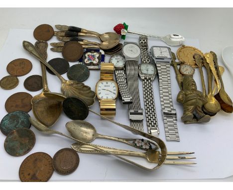 A mixed lot including enamel part buckle, policeman door knocker, watches by Ingersoll, Casio, Skagen, Vivani and a small qua