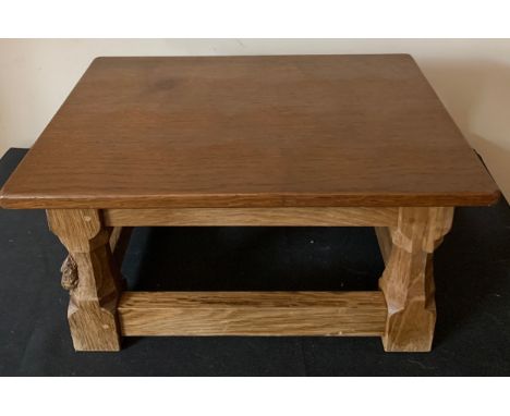 A medium oak Robert (Mouseman) Thompson footstool with adzed top.  40cms x 28cms x 20cms h.Condition ReportWear to base of le