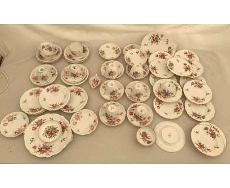 A Royal Crown Derby 34 piece part tea service, Derby Posies comprising: 6 cups 7cms h, 10 saucers, 14 side plates 16cms, cake