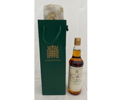 A House of Commons blended Scotch Whisky 70cl signed by Boris Johnson PM in a presentation green bag. . All proceeds to the S