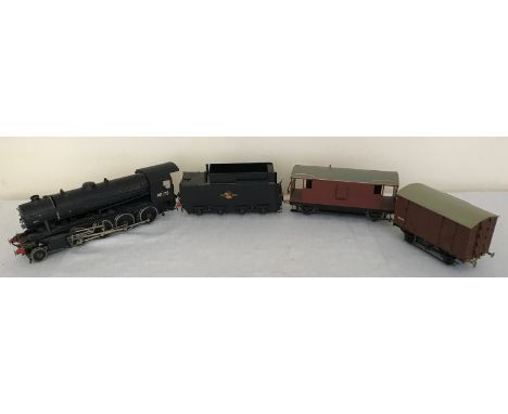 An 0 gauge scale model BR tinplate Locomotive Engine 90178 and Tender together with 2 plastic model wagons of meat van and gu