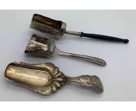 Three various continental silver scoops and caddy spoons.Condition ReportGood condition.