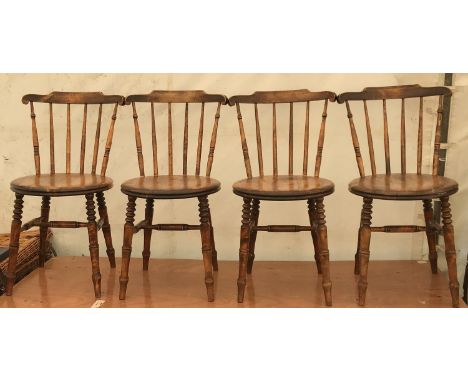 Six ibex stick back turned wood chairs with circular base including 2 carvers. Chairs 82.5cms h floor to base seat 46cms. Car