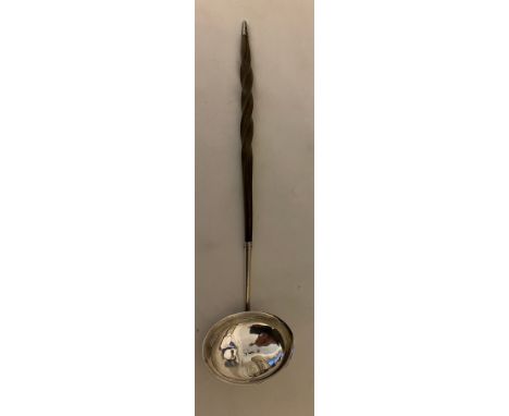 A silver toddy ladle with a twisted whalebone handle, London 1815, William Bateman.Condition ReportGood condition.