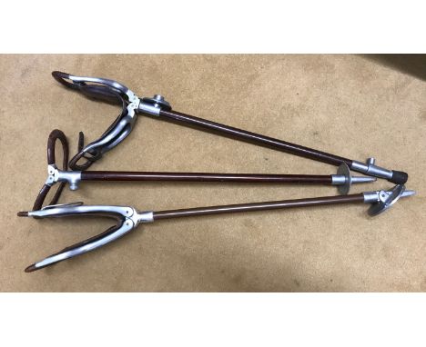Three hunting sticks, leather seats. 89cms l.Condition ReportSome scuff wear to the leather, overall good condition.