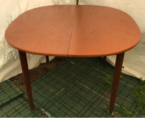 A G Plan teak extending dining table. 73cms h x 107cms w, extended 107cms x 148cms.Condition ReportSigns of use with light su