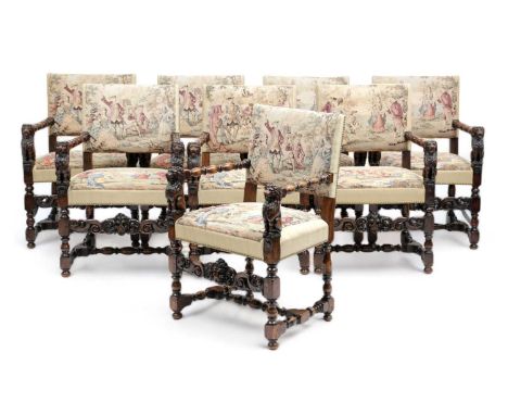 A SET OF EIGHT ITALIAN WALNUT DINING ARMCHAIRS IN RENAISSANCE STYLEIN THE MANNER OF ANGIOLIO BARBETTI (1805-1873), 19TH CENTU