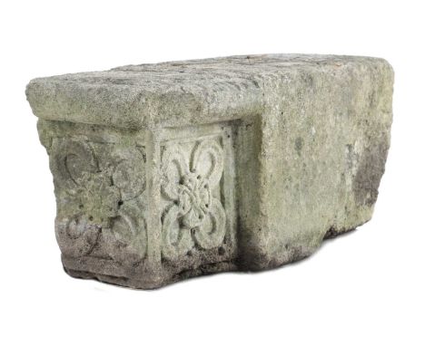 A CARVED STONE ARCHITECTURAL FEATURE18TH CENTURY OR EARLIERpossibly a corbel, of square section and carved with quatrefoil tr