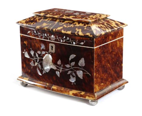 λ A WILLIAM IV TORTOISESHELL AND MOTHER OF PEARL TEA CADDYC.1830-40of bowfront pagoda form, inlaid with pewter stringing, the