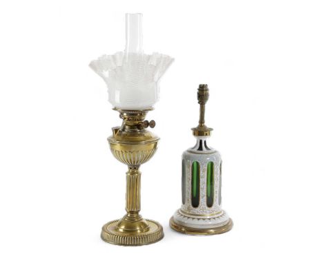 A BOHEMIAN GLASS TABLE LAMPLATE 19TH CENTURYwhite cut through to green with gilt floral decoration, together with an Edwardia