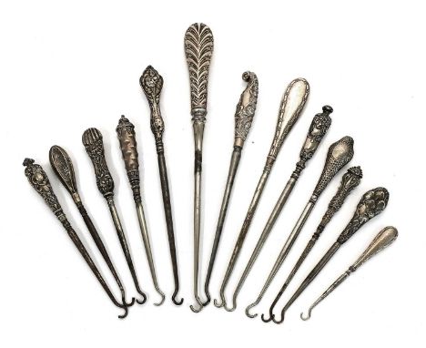 A Collection of Assorted Silver Handled Button-Hooks, of various styles and sizes,(13)