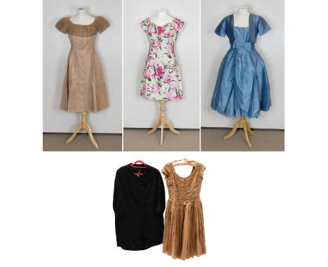 Circa 1950s Evening Wear, comprising a black textured evening jacket in a 'cocoon' style with scooped neckline, two large but