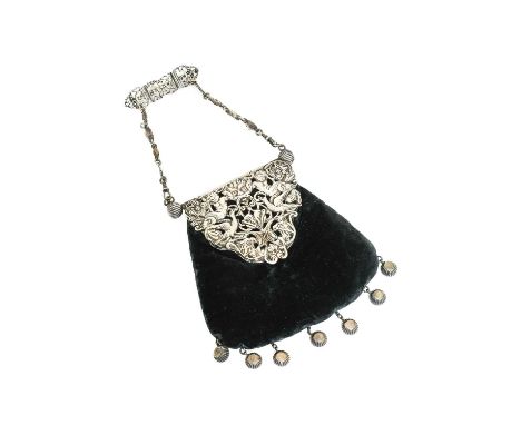 Late 19th Century Black Velvet Purse, with pierced silver hinge and flap depicting exotic birds, cherubs, mask amongst scroll