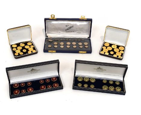 A Collection of Assorted Cased Sets of Buttons, comprising fourteen circular buttons with a swirled design in a fitted case l