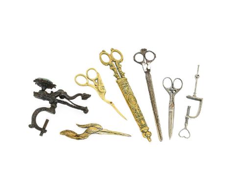 19th Century and Later Sewing Tools, comprising a steel clamp with heart shaped terminal to screw fitting 20cm, pair of decor