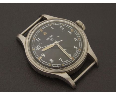 Smiths W10 Military issue stainless steel gentleman`s wristwatch, circa 1967, the black dial with Arabic numerals and centre 