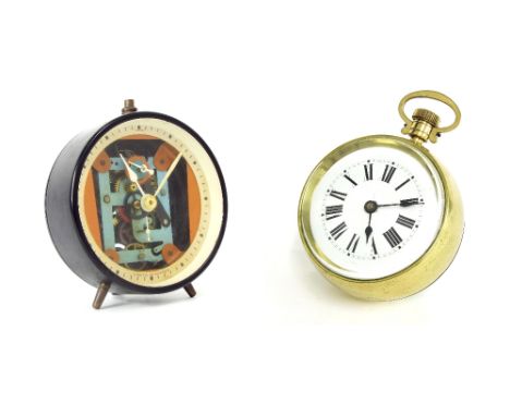 Brass ball desk clock, the 3.5" white dial within a bevelled glazed case and the movement under a magnified hemispherical gla