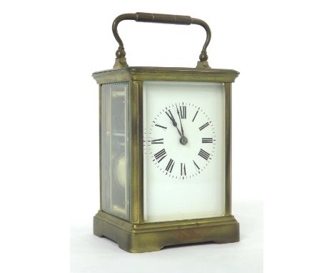 French carriage clock striking on a gong, within a corniche brass case, 7" high (key)